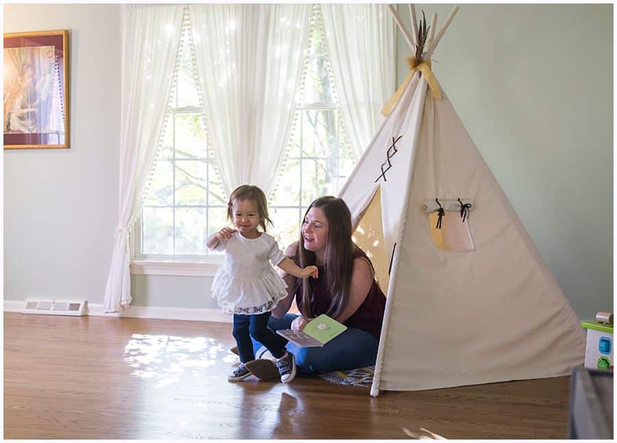 mom and daughter in teepee in regent square home