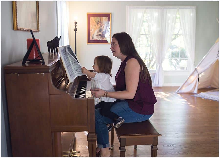family photography session regent square mother and daughter at piano 
