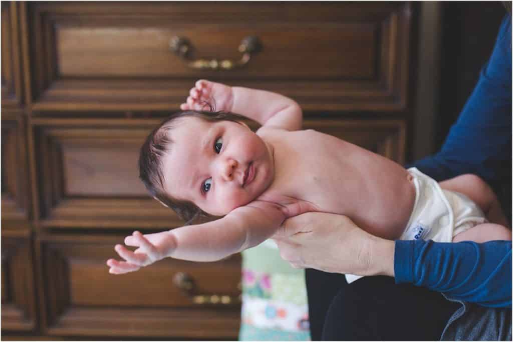 newborn baby stretching mary beth miller pittsburgh photographer 