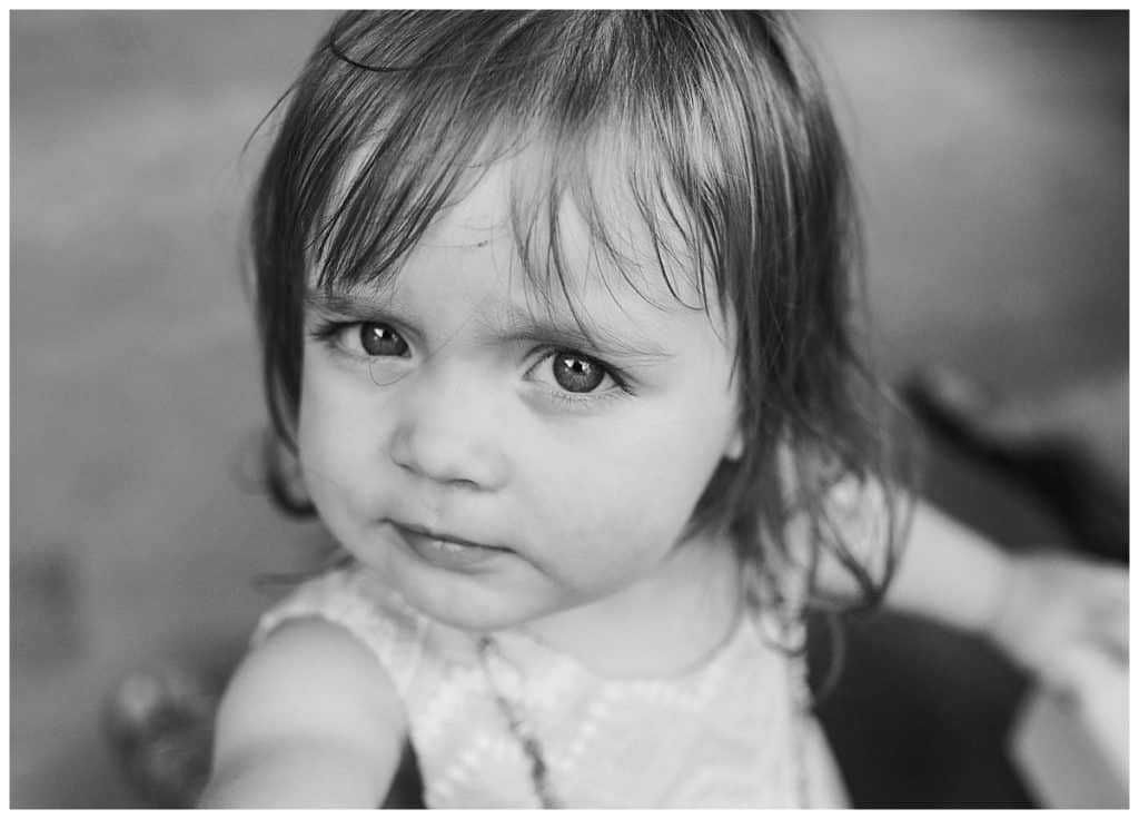 black and white photo of toddler girl