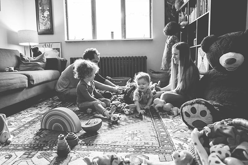family playing together at home for a lifestyle photo session