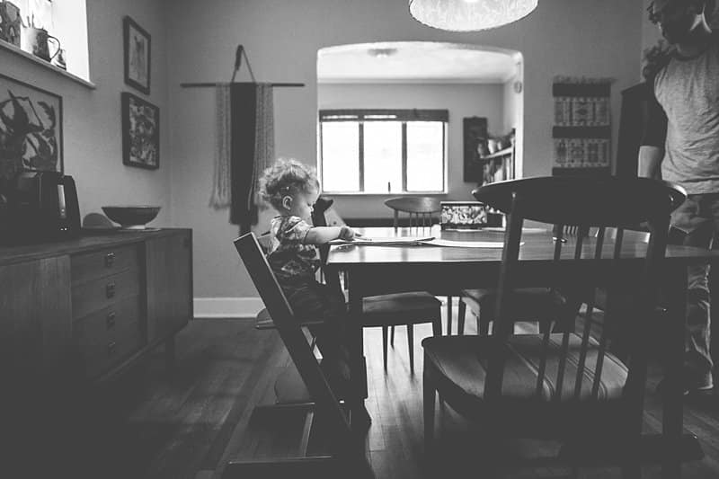 little boy at table for a photo session at his home in pittsburgh
