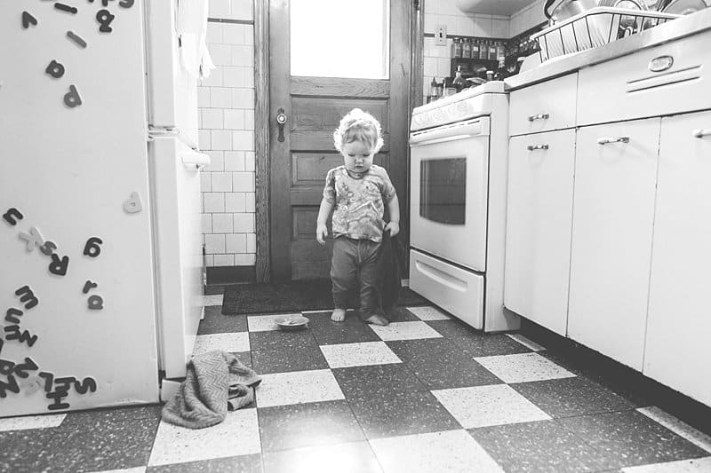 little boy in kitchen for a photo session at his home in pittsburgh