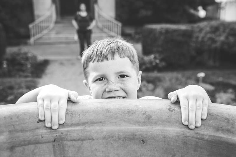 boy at pittsburgh phipps by fountain for family photo session