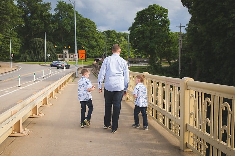 father and sons on panther hollow bridge pittsburgh phipps in tree for family photo session