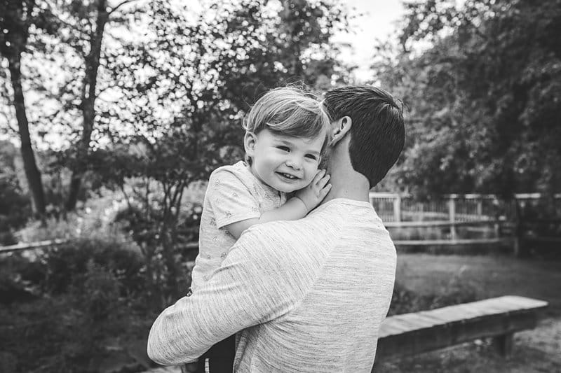 father hugging son at family photo session at beechwood farms pittsburgh 