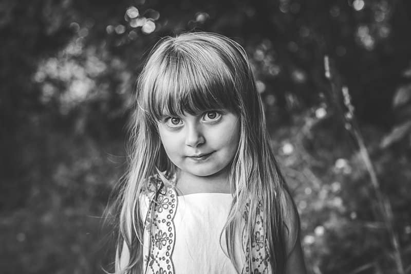 piercing eyes of little girl black and white photo