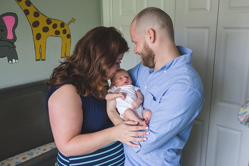 pittsburgh mom in nursery with newborn lifestyle photo session 