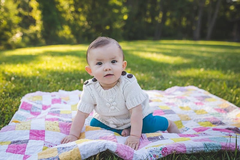 baby girl on quilt at pittsburgh park