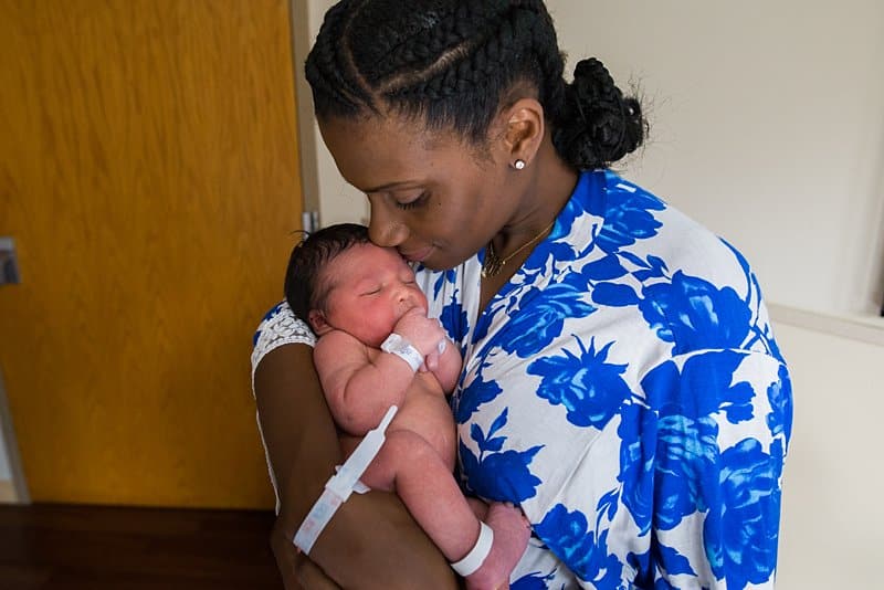 mom at magee hospital holding newborn baby
