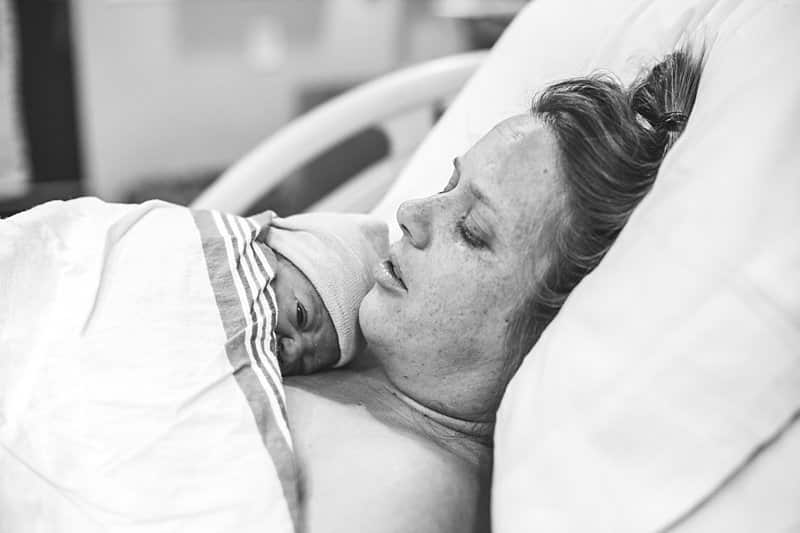 mother with newborn on chest after natural birth to baby at magee womens hospital