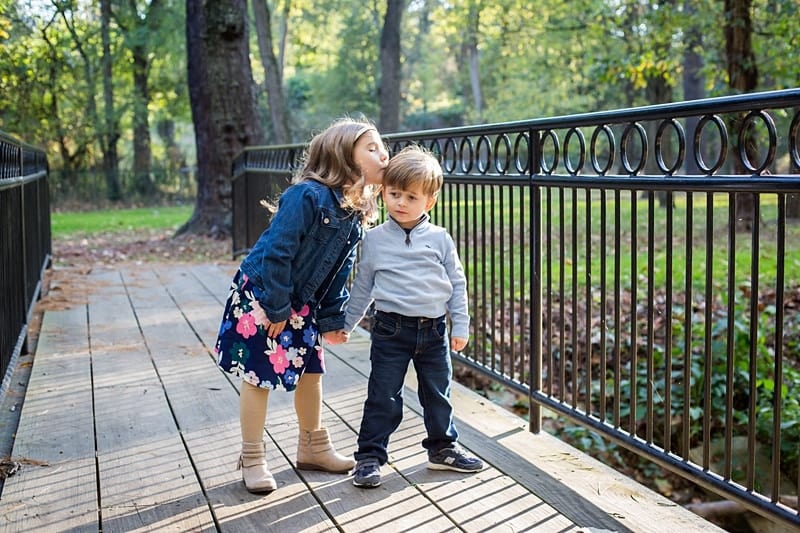 brother and sister sewickley park on bridge  photo session at morrow pontefract park Mary Beth Miller photography 