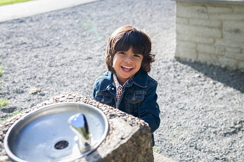 little boy at water fountain squaw valley park fox chapel