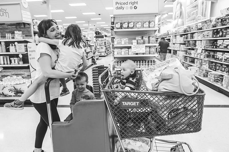kids in shopping cart at target
