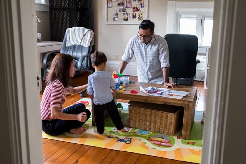 mother father and son painting together in shadyside home