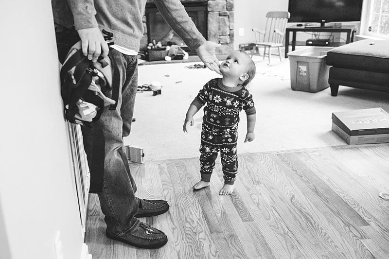 little boy looking up at dad