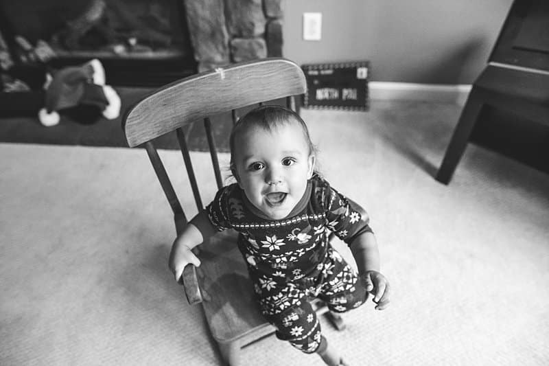 little boy sitting in rocking chair