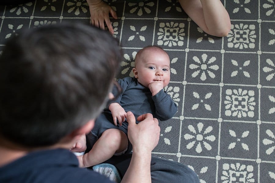 three month old baby on floor for photo session