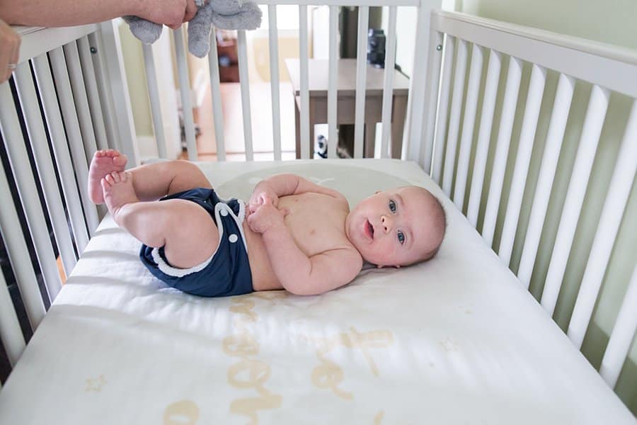 baby in crib for lifestyle newborn session in South Hills Pittsburgh Baby photographer  home