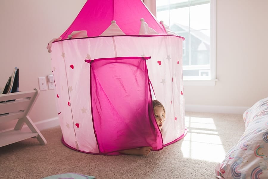 pittsburgh girl playing in bedroom in tent