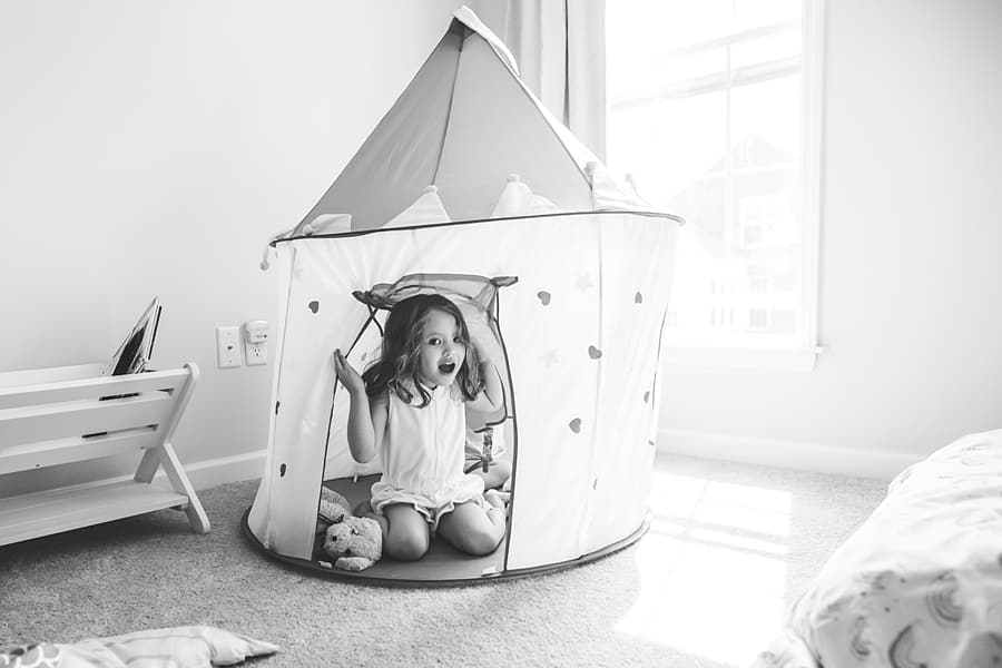 pittsburgh girl playing in bedroom in tent