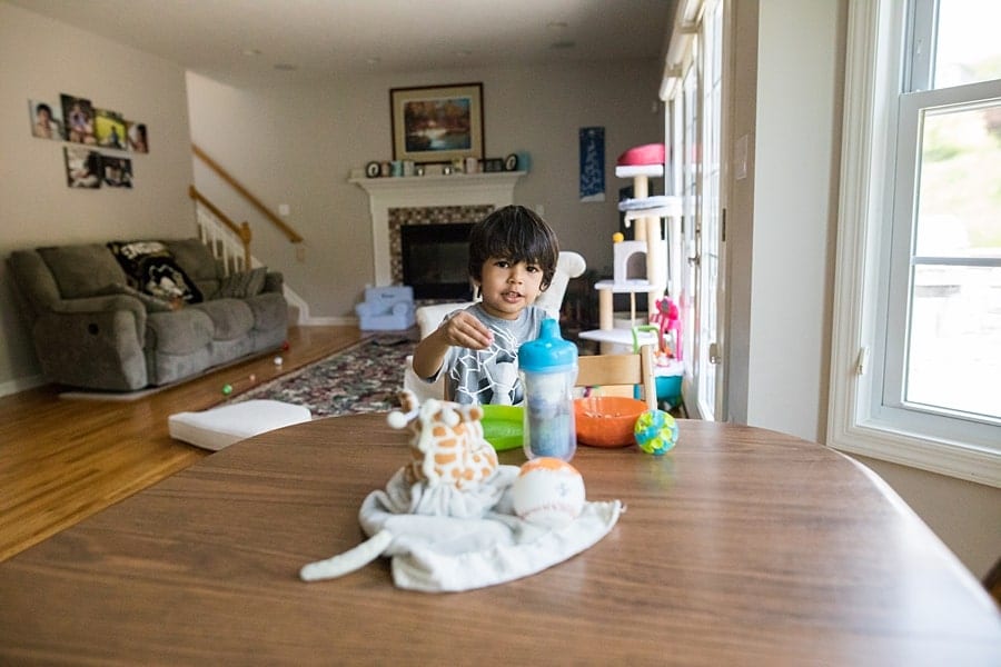 boy in the kitchen of his pittsburgh home for a family photo session
