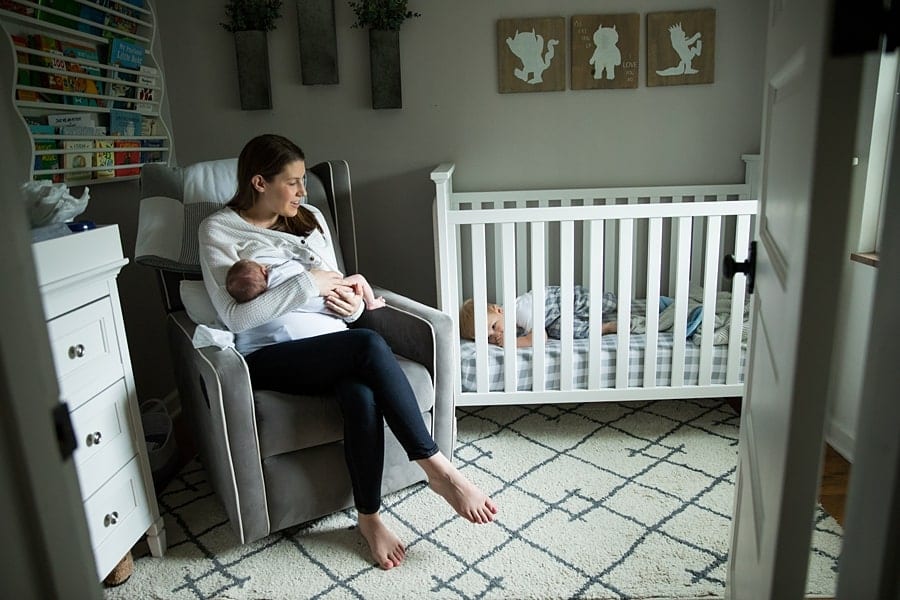 toddler in crib in pittsburgh nursery for photo newborn photos with baby Parker