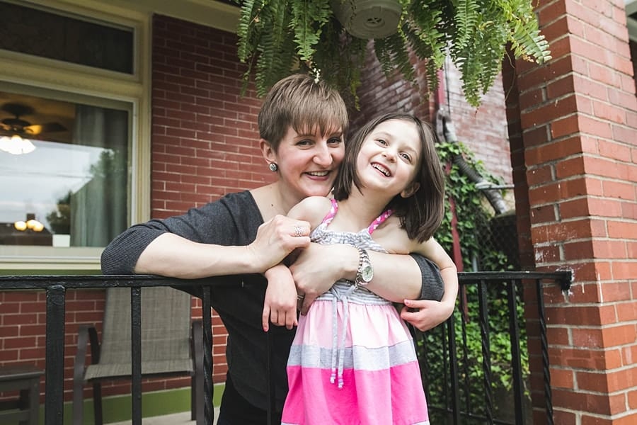 mother and daughter on porch of point breeze home