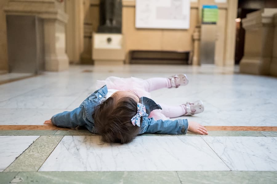 little girl on floor at carnegie natural history museum of pittsburgh
