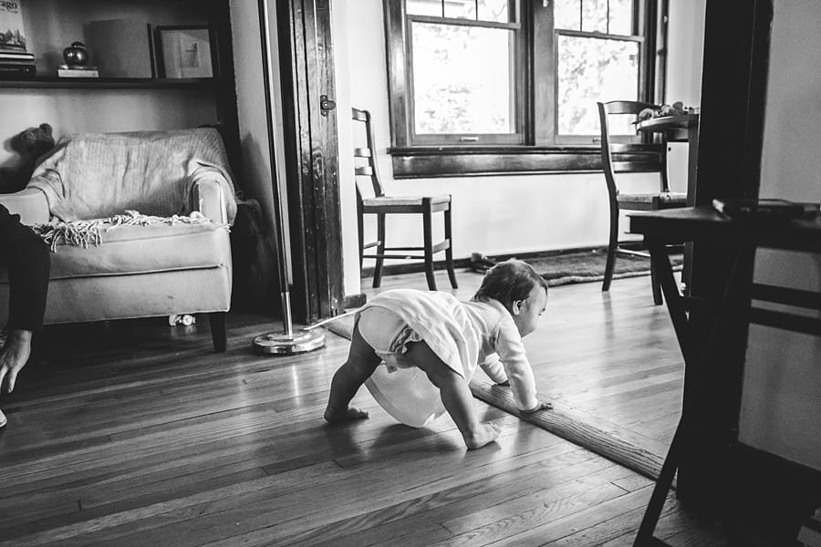 baby crawling on floor for documentary family photo session in pittsburgh
