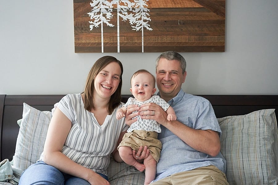 mom dad and baby in warren dale bedroom Pine Township Family Photographer