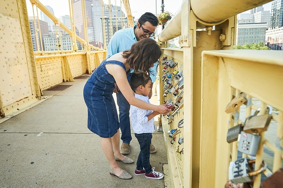 Family photos downtown Pittsburgh on the North Shore and Clemente Bridge