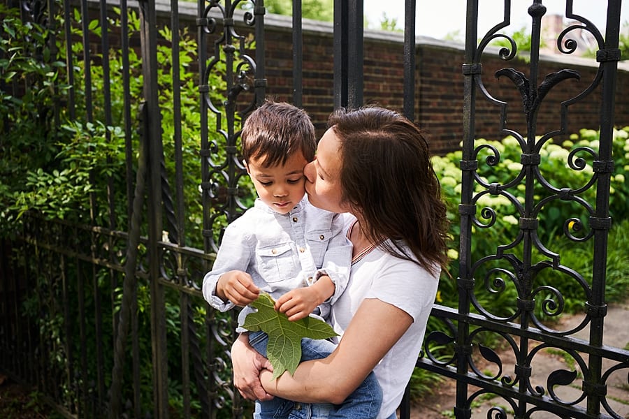 mom and son at gates at mother and son photo Session at Mellon Park