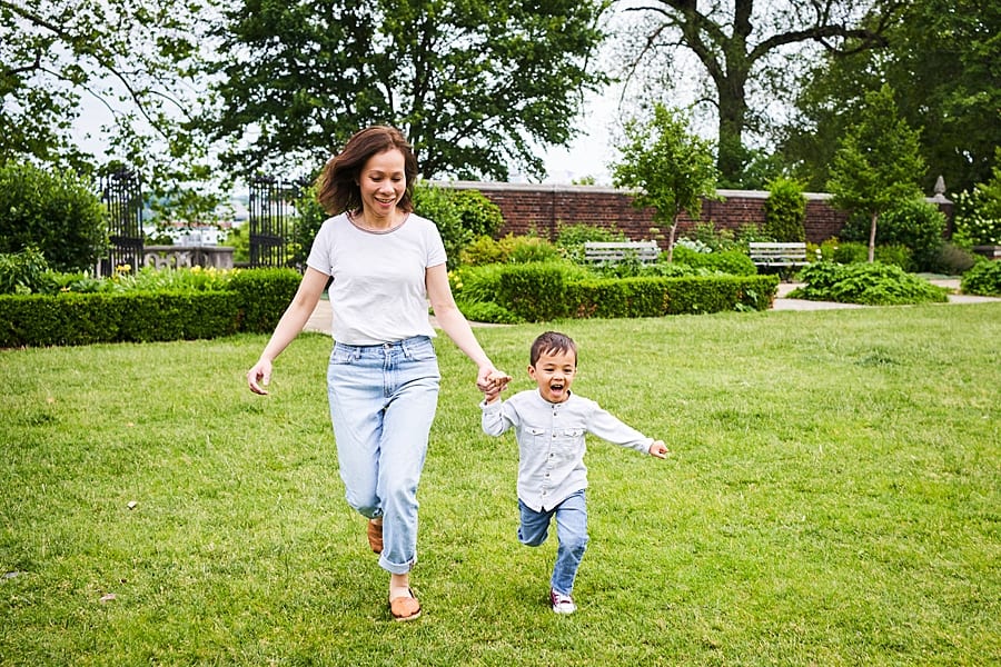 little boy running through park with mom holding hands mother and son photo Session at Mellon Park