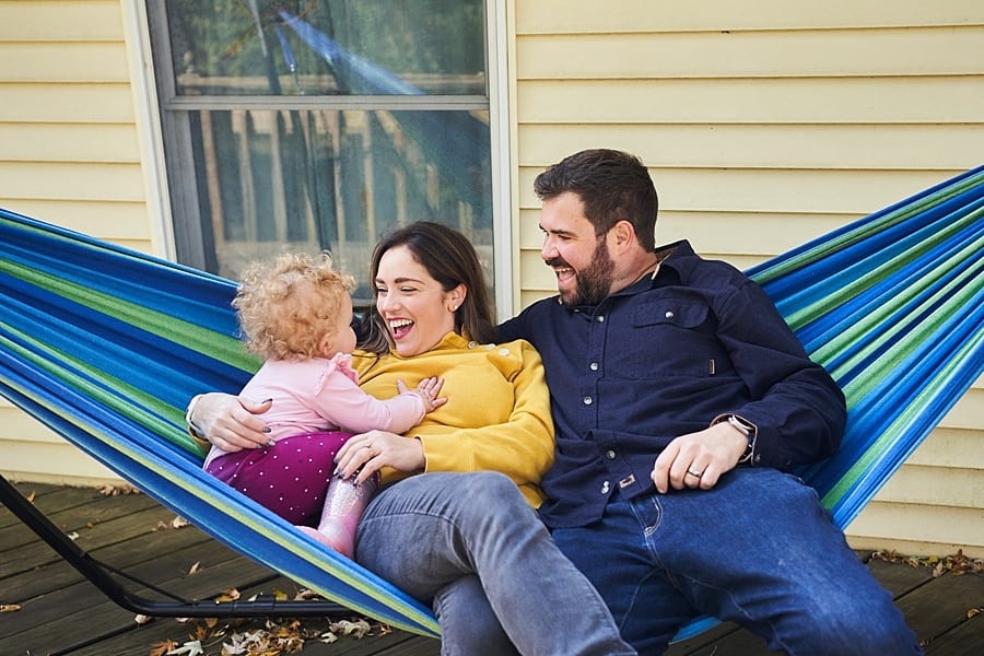 family in hammock for part 2 Staying home | Family photos in the backyard