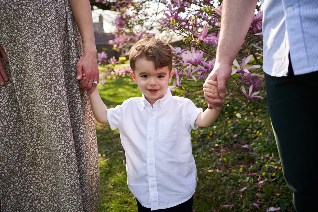 Little boy at Mellon park family photos maternity pictures spring blossoms