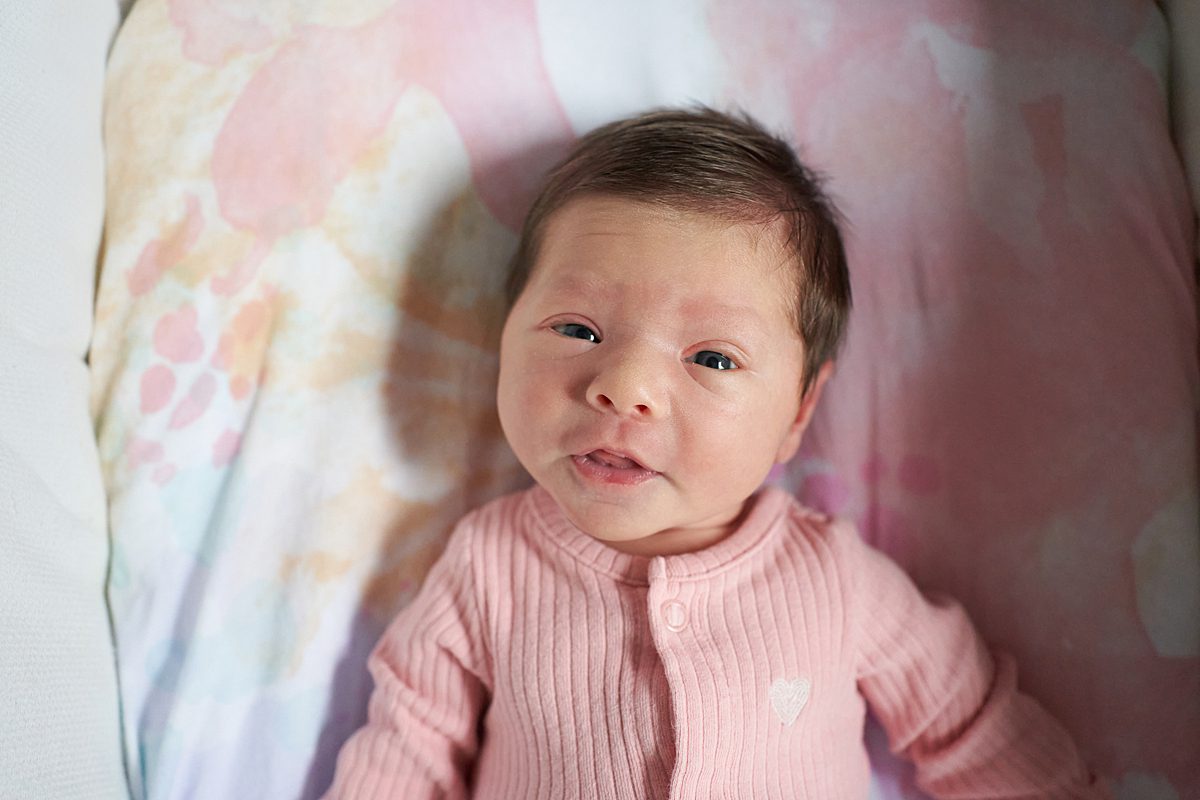 baby girl wide awake for newborn photo session seven fields 
