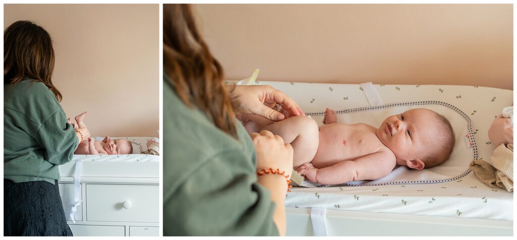 A woman changing a baby's diaper on a changing table.