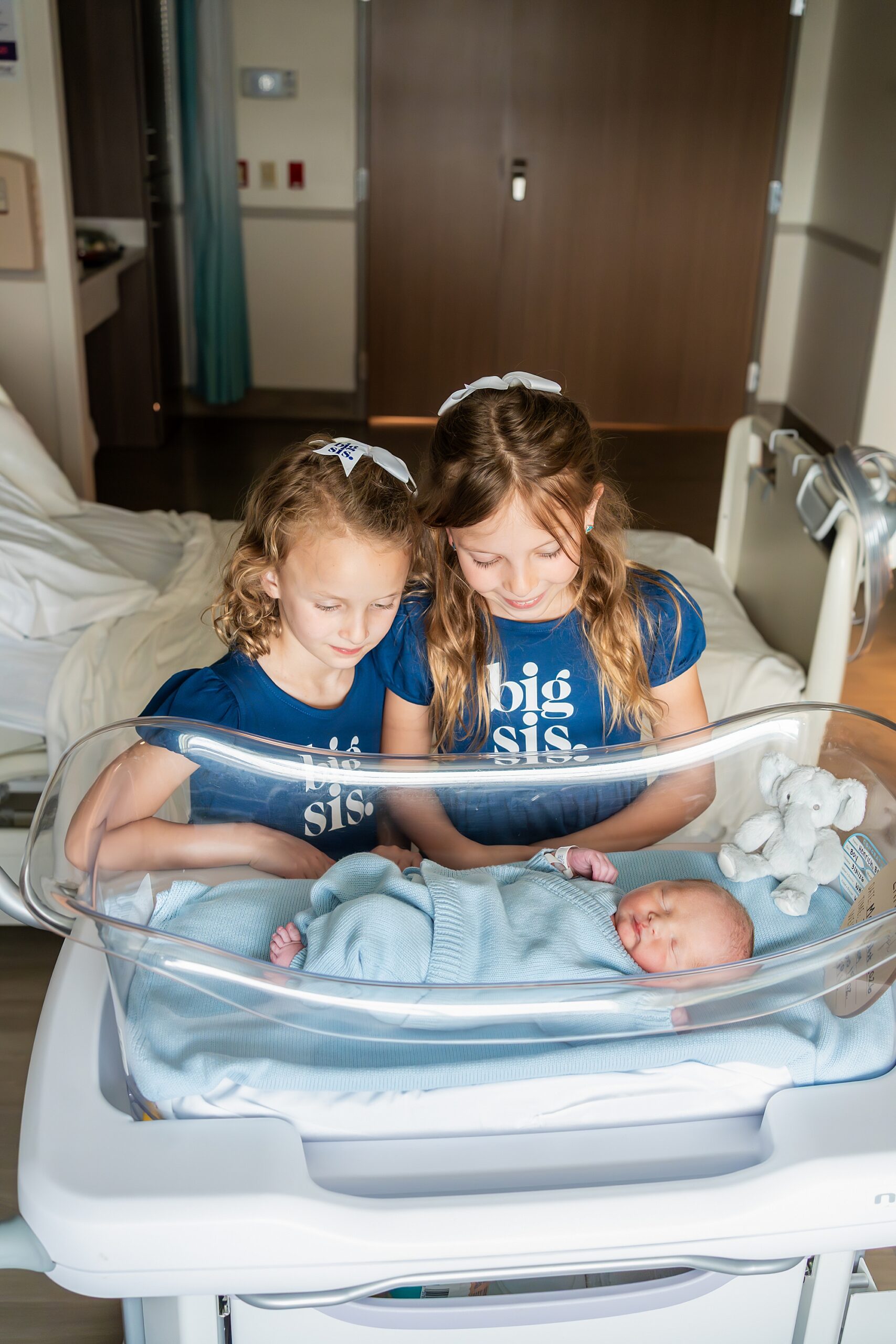 Two young girls wearing 